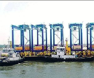 The barge carrying the first set of six rubber-tyred gantry cranes, imported from Abu Dhabi for installing at the Vallarpadom International Container