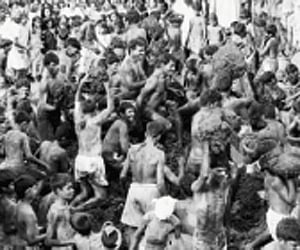 Villagers playing with cow dung balls at Gumatapura on Karnataka-Tamil Nadu border|Ra Mahadev