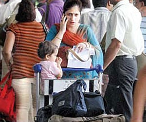 Stranded passengers at Delhi airport on Wednesday.