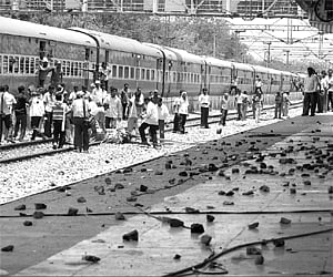 Telangana supporters pelting stones at the waiting room at Mahabubabad railway station on Friday in which Congress leaders and Jagan loyalists Konda S
