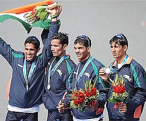 India's lightweight four rowing team celebrate their silver medal at the 16th Asian Games in Guangzhou, China