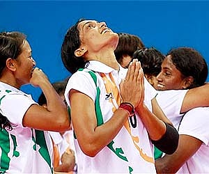 from left, Sanahanbi Devi Kangabam, Mamatha, and Bai V Tejeswini celebrate after winning the women's kabbadi final at the Asian Games. AP