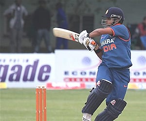 Indian captain Suresh Raina, plays a shot during a match against Sri Lanka at Queens Sports Club in Bulawayo. AP Photo
