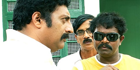Director Hari on the sets of 'Singam' (Far right) (Pic: ENS)