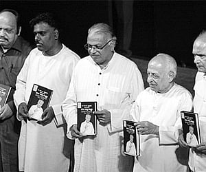 A file photo of sand-laden trucks near Industrial Growth Centre on the outskirts of Hassan.