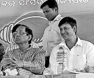Pyarimohan Mohapatra and Siddhant Mohapatra at a public meeting in Deogarh I Express
