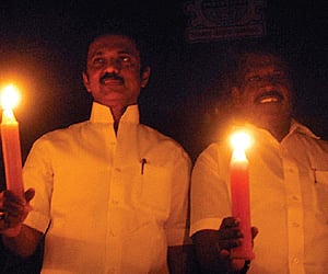 Deputy CM MK Stalin, along with Exnora founder MB NIrmal, Anna University Vice Chancellor Mannar Jawahar, holding candles in Chennai on Sunday.