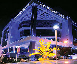The Anna Centenary Library, which has been lit up on the eve of Wednesday’s inauguration, at Kotturpuram in the city.(ENS)
