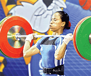 Heavy Mettle: Indian lifter Ngangbam Soniya Chanu en route to winning a silver medal in the women’s 48-kg event in New Delhi on Monday | Jipson Sikher