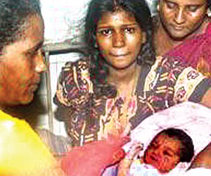 A woman whose baby was mistakenly swapped by a midwife at Corporation’s maternity hospital at Shenoy Nagar on Saturday.