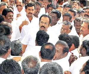 DVAC officials coming out of the residence of former minister K R Periyakaruppan, at Tiruppathur in Sivaganga district | EPS