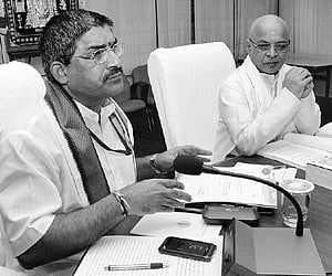 Yesteryear film star Kanchana handing over property documents to TTD EO IYR Krishna Rao at Tirupati on Monday.