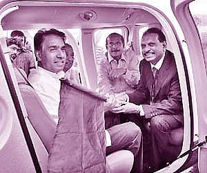 CIAL managing director C G Krishnadas Nair and CIAL director M A Yusef Ali flagging off the heli taxi service at Kochi airport.