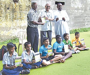 K Arumugam, hockey analyst, S Muthiah, journalist and Fr Gregory Devaraj, headmaster, St Bede’s HSS at the launch of the book in Chennai