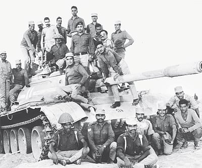 Indian soldiers with a captured Pakistani tank in the western sector