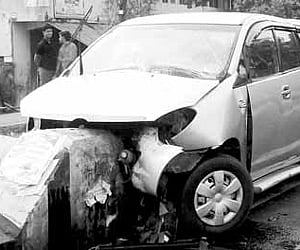 The mangled remains of Jagathy Sreekumar’s car which rammed into a divider at Panambra near Calicut University on Saturday