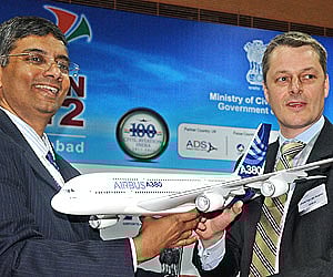 Joost Van Der Heijden and Srinivasan Dwarakanath show the replica of Airbus 380| Express Photo by RVK Rao.