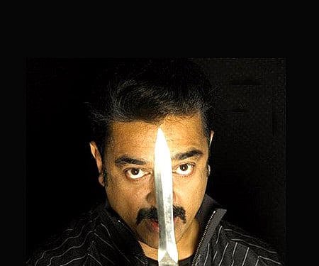 From the poster of 'Vettaiyadu Vilayaadu'.