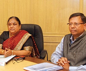 Maharashtra Election Commissioner Neela Satyanarayan and Thane Municipal Commissioner R A Rajeev