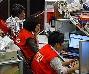 Asian markets showed a mixed trend on Friday.