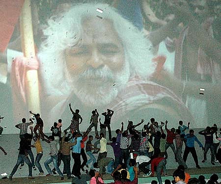 Crowds dancing on the screening of 'Jai Bolo Telangana' at Devi theater in Hyderabad| Express Photo by K Sai Ramesh