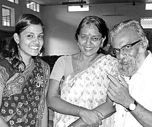P Balachandran amidst his students and colleagues at the School of Letters, MG University, in Kottayam on Tuesday. His wife Sreelatha Balachandran is