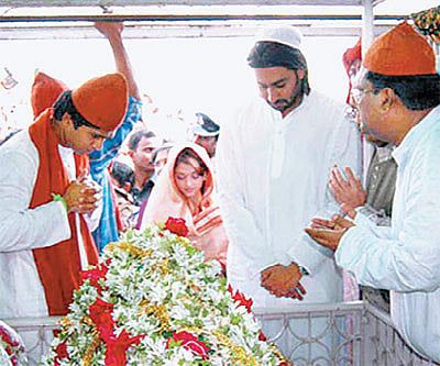 Star couple Abhishek Bachchan and Aishwarya Rai at the Kadapa Dargah; (below) composer A R Rahman, a frequent visitor