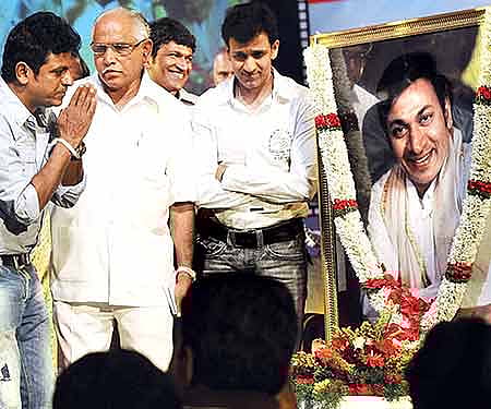 Actors Shivarajkumar, Raghavendra, Puneet Rajkumar and Chief Minister BS Yeddyurappa paying tributes to Dr Rajkumar| Vinod Kumar T.