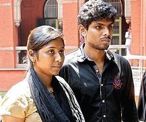 FIGHT FOR RIGHT: Vidya Rani, daughter of slain forest brigand Veerappan, with husband Mariya Deepak on the High Court premises after their reunion.