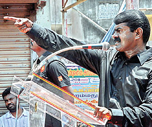 NO HOLDS BARRED: Naam Tamizhar Katchi leader Seeman addressing a public meeting at Alandur on Monday | J Manoharan