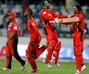 Cricketers of Trinidad and Tobago celebrate their victory over Ruhuna Squad (PTI)