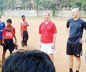 UEFA professional coach Harald Braner and his son and coach Frank Braner with AIFF director, coaching, Gabriel E Joseph at the youth soccer developmen