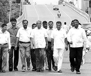 Ramachandra Gowda walking from his home to office during the bandh.