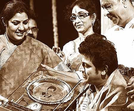 D Purandeshwari presenting NTR National Award to actor Shivarajkumar; actress Bharathi Vishnuvardhan looks on| Nagesh Polali.