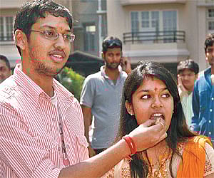 Shirish with Sriji come out of a temple after their wedding in October 2007