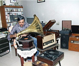 Kiran with his gramophone record player collection