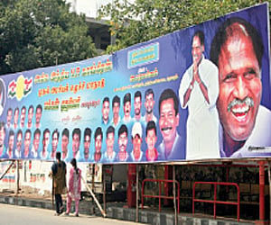 Giant banners put up by various political parties on MG Road near Muthialpet in Puducherry | G Pattabira