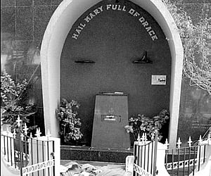 The desecrated statue of Mother Mary at the Holy Family Church.