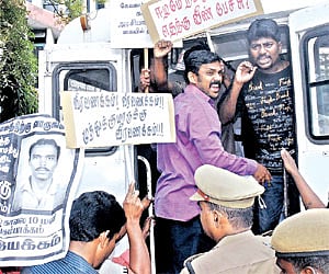 Activists who observed the death anniversary of Muthukumar being taken into custody by police at Shastri Bhavan, in the city on Friday/P Jawahar.