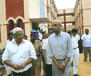 Kodaikanal school correspondent M L Brite (right) and his laywer come out of the Judicial Magistrate Court in Srivilliputhur in Virudhunagar district,