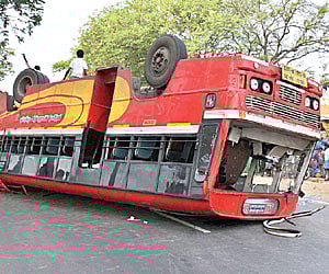 The TNSTC bus that overturned at Kilambakkam, GST Road, on Tuesday.