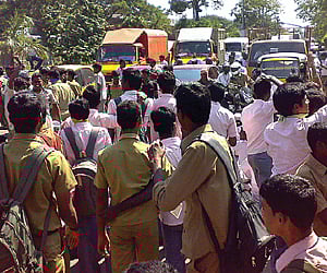 Students of the Central Polytechnic College at Taramani blocking roads as part of their protest, on Friday