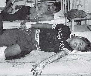 A priest blessing a devotee on the occasion of Maasi Magam at the Vaithikuppam near the beach on Friday in Puducherry | Photo EPS