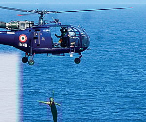 The crew of a helicopter from INS Rana display their rescue skills as part of the naval exercise off the city’s coast on Sunday. (File)