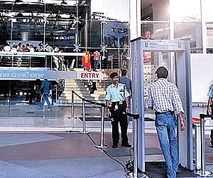 A customer entering through a metal detector at a shopping mall in Hyderabad| Express Photo.