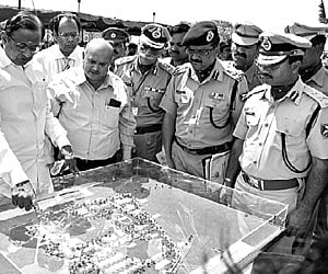 WELL POSITIONED: Home Minister P Chidambaram involved in a discussion with ITBP officers in Madurai on Wednesday.