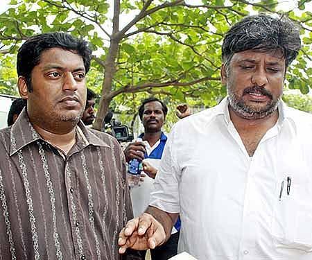 Rumesh Babu, producer of 'Kaavalan', with his advocate - Express/Martin Louis.