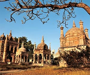 Clockwise from above: The British cemetery at Surat has a magnificent mausoleum of important East India Company officials from the days when this cit