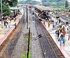 The KR Puram railway station is devoid of shelter and washrooms. Passengers have to wait in the heat and the rain for their train | nagesh polali