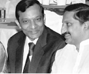 ENS Chief minister N Kiran Kumar Reddy with president of Mahindra  & Mahindra Limited Pawan Goenka at the foundation stone laying ceremony of the comp